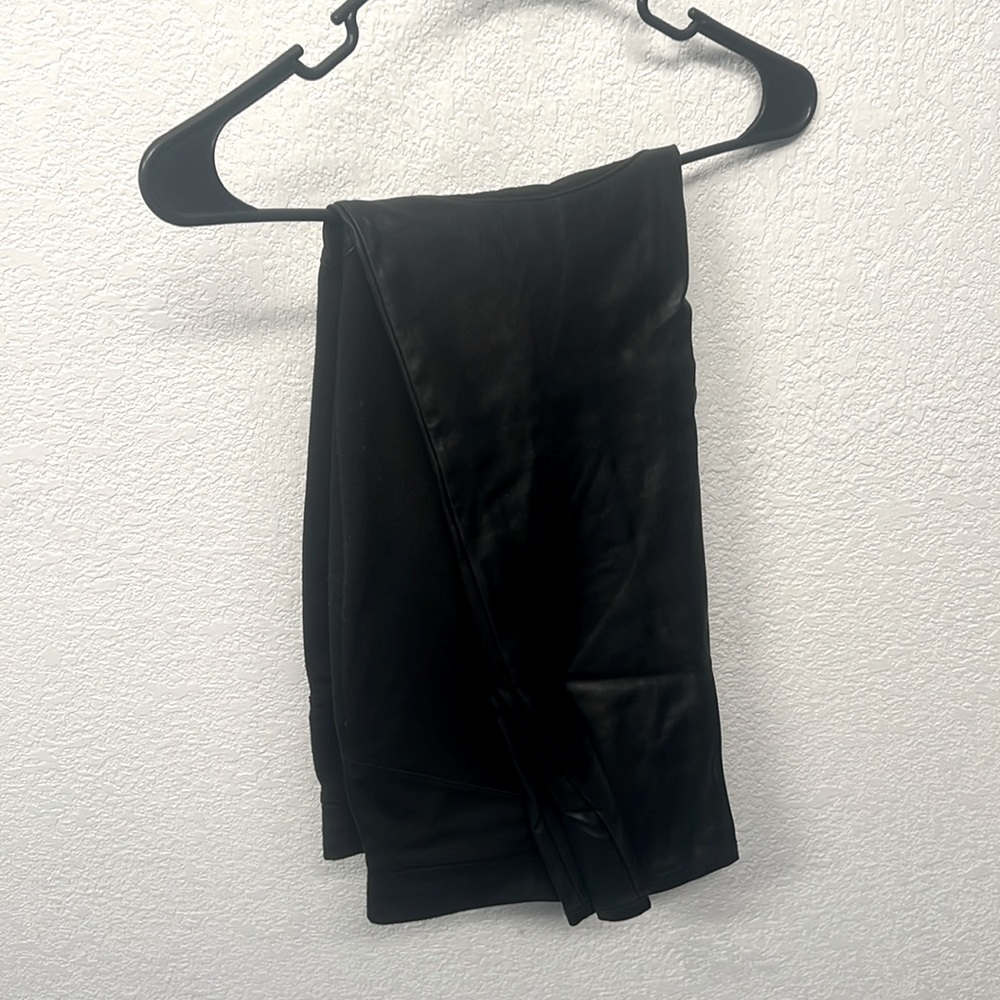 Black faux leather pants